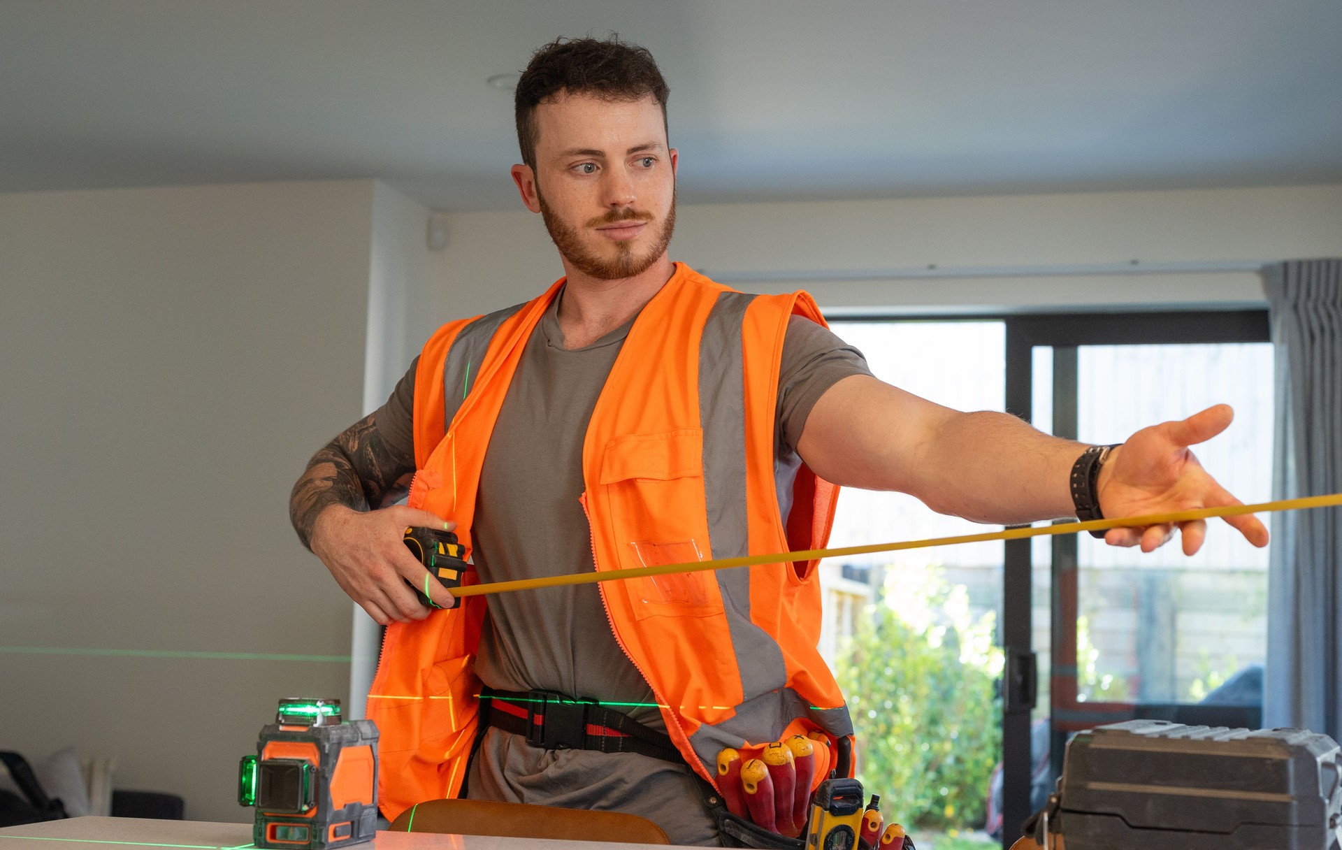 construction worker using his tools